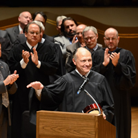Court of Appeals Judge Russell Carparelli is applauded during a ceremony at the Supreme Court Assembly of Lawyers on Oct. 29, 2012, after accepting the Chair’s Award for Civility in Law from the American Bar Association Section of Dispute Resolution.