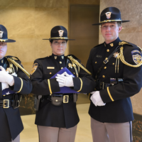 A Colorado State Patrol color guard raised the American and Colorado flags for the first time during a Jan. 14, 2013, celebration marking the opening of the Ralph L. Carr Colorado Judicial Center.