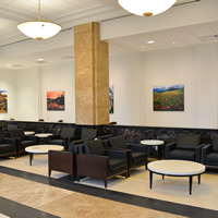 A commons area with photographs by John Fielder on the ground floor of the Ralph L. Carr Colorado Judicial Center.