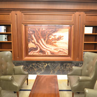 One of the paintings in the art installation “The Face of Justice” by Ken Bernstein, all of which are displayed in the Supreme Court Law Library.