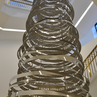 A view of the art installation “Scintillation” by Thomas Sayre, hanging in the Monumental Staircase in the courthouse building of the Ralph L. Carr Colorado Judicial Center.
