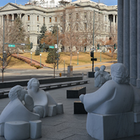 Figures from “Justice for All” by Madeline Wiener, displayed on the front plaza of the Ralph L. Carr Colorado Judicial Center.